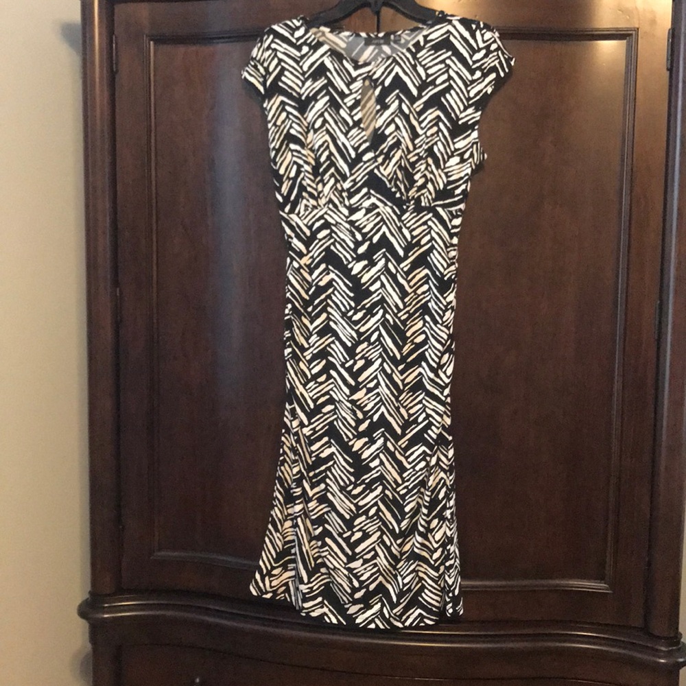 Black and white patterned dress.